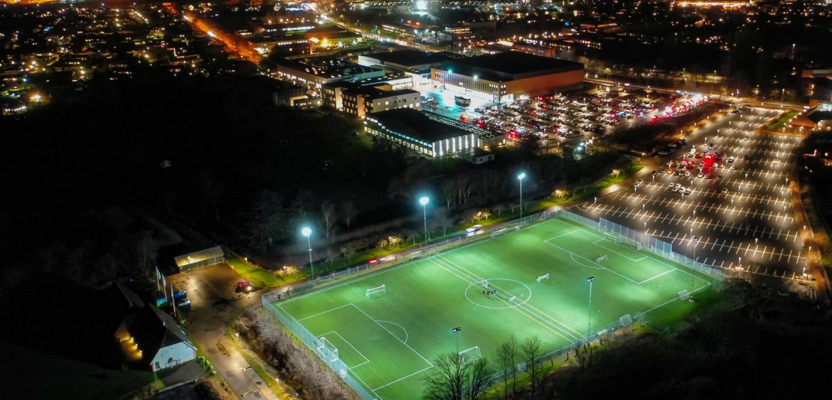 FIF football field with Frederiksborg Centret and Royal Stage in the background.