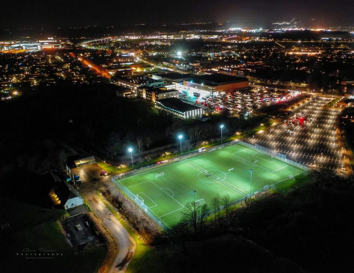 FIF football field with Frederiksborg Centret and Royal Stage in the background.