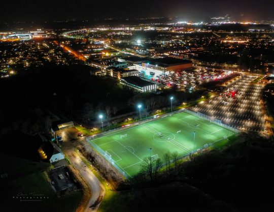 FIF football field with Frederiksborg Centret and Royal Stage in the background.