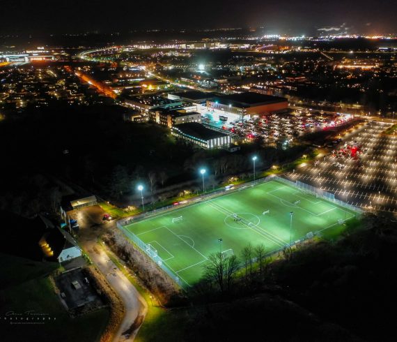 FIF football field with Frederiksborg Centret and Royal Stage in the background.